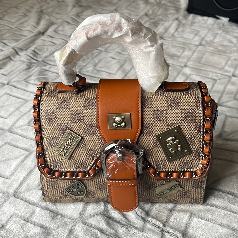 brand new hand held bag/ sling bag